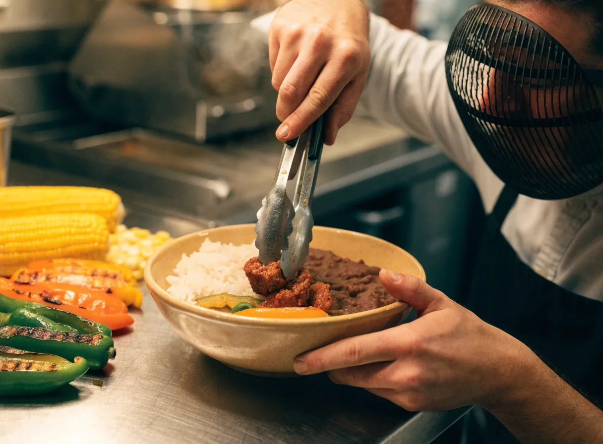 Assembled baja bowl with sweet pork and fresh toppings