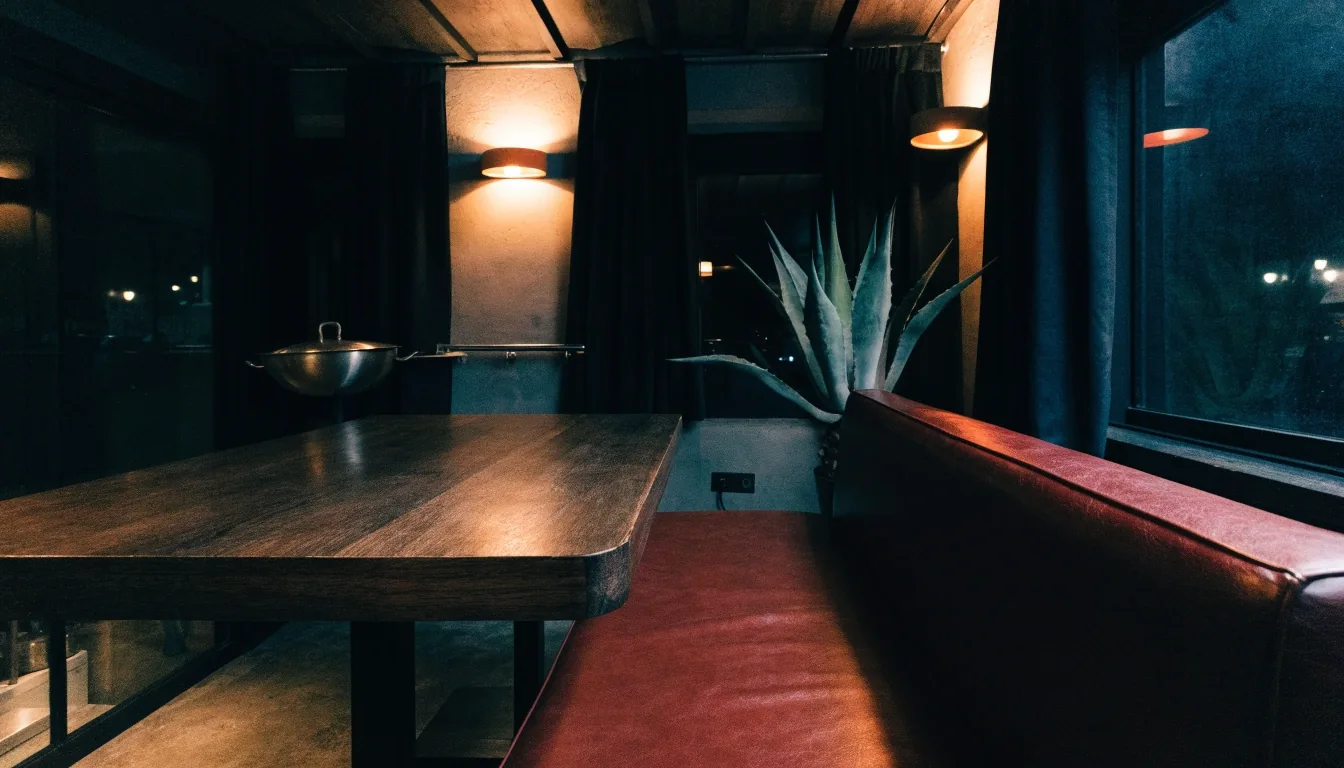 Warm dining room of a Costa Vida fresh Mexican restaurant at night